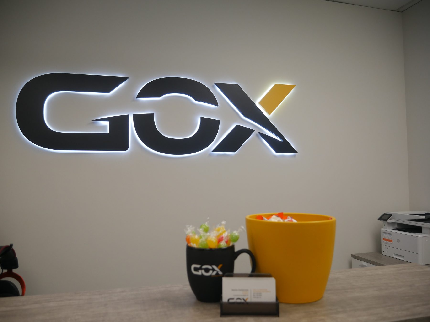 The GOX reception: the mark on the wall, a mug, a bowl of candy.